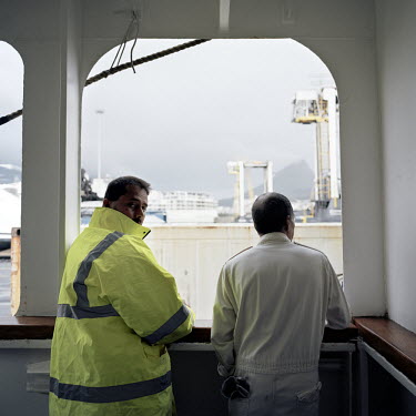 Dock workers in Cape Town load the RMS St Helena with cargo. There are only two remaining Royal Mail Ships, the other being Cunard's Queen Mary 2. The RMS St Helena is the only link to the outside wor...