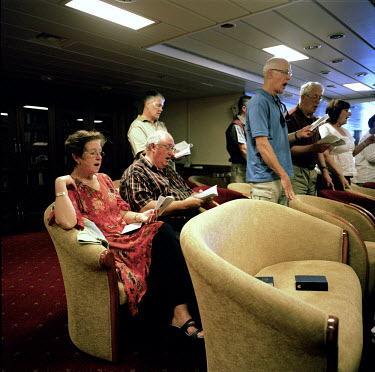 Sunday morning service in the main lounge of the RMS St Helena. There are only two remaining Royal Mail Ships, the other being Cunard's Queen Mary 2. The RMS St Helena is the only link to the outside...