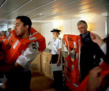 Passengers onboard the RMS St Helena take part in a safety drill before setting sail. There are only two remaining Royal Mail Ships, the other being Cunard's Queen Mary 2. The RMS St Helena is the onl...