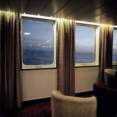 A view out of the main lounge across the Atlantic Ocean. There are only two remaining Royal Mail Ships, the other being Cunard's Queen Mary 2. The RMS St Helena is the only link to the outside world f...