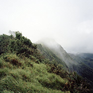 Mist crowns a ridge of hills on the island of St Helena.