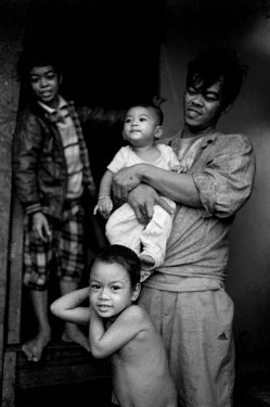 Ronaldo and his children. He says of Typhoon Haiyan: 'We ran when we saw the water leaving the bay. We ran and we ran. A big black wall of water came and'smashed everything. One of my sons was killed....