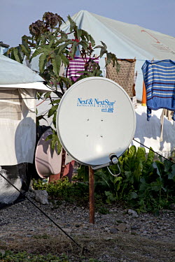 Satellite dishes outside tents at Osmaniye refugee camp.