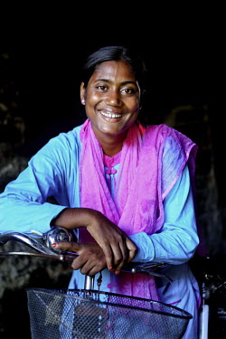 Info Lady Mahfuza and her trusty bicycle. In rural Bangladesh the Info Ladies are bringing internet services to men and women who need information but don’t have the means to access the web. After t...