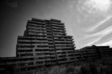 One of the seven 'sails' called the Vele di Scampia (Sails of Scampia), a housing complex (by architect Franz di Salvo) built during the 1960s and early 1970s. Seven separate Ziggurat -like blocks, we...