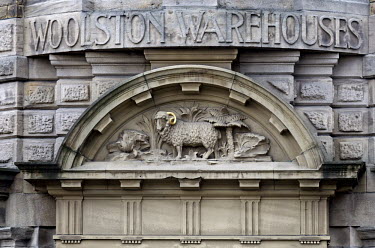 A stone carving featuring a sheep above the doorway of a former wool warehouse in Bradford, which was once the city at the centre of the world's woollen textiles industry. The building has been conver...