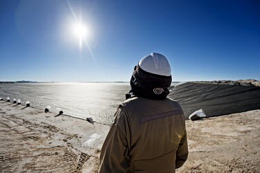 A km2 lithium processing pool covered in black PVC to protect it at the lithium extraction facility 14 kms into the Salar de Uyuni. The lithium suspension cannot be allowed to interact with the salt o...