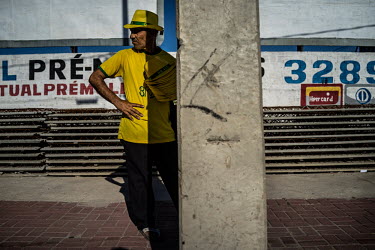 A man sells hats outside the stadium where Brazil defeated Colombia in the quaterfinal of the 2014 World Cup in Fortaleza. The score was 2:1.