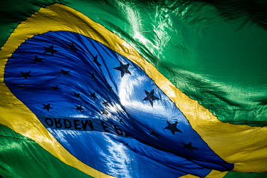 A huge Brazilian flag blows in the wind at the Fortaleza stadium before Brazil played Colombia in the quarter final of the Football World Cup. Brazil won 2:1.
