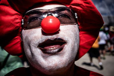 A Fan wearing a hat and a clown's nose at the Mexico vs Netherlands match in Fortaleza. The Netherlands won the game 2:1.