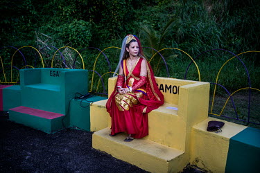 A spiritual medium waits for the beginning of a ritual at the Vale do Amanhecer spiritual center in Recife. The religious community of the Vale do Amanhecer (Valley of Dawn) is based on a doctrine tha...