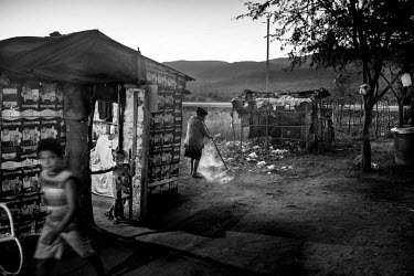 Residents prepare for the night at Ipiranga camp. Ipiranga is a squatter's camp for landlesss workers in Pernambuco state. As a part of Movimento dos Trabalhadores Rurais Sem Terra (MST), a social mov...