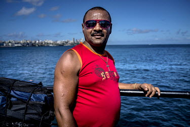 A portrait of a man on the ferry boat between Salvador and Bom Despacho in  Bahia, Brazil