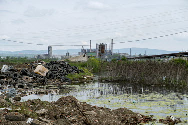 A view of a rubbish dump with a power station in Obilic in the background. The power station burn lignite, and even with the installation of new filters, produces pollution many times over EU safety l...