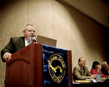 Mr. Tom Wilder, president of the Panama Canal Society, gives a speech at the Annual Business Meeting of 2013 Panama Canal Society Reunion, at the Marriott Hotel in Orlando, Florida.