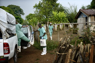 MSF (Doctors Without Borders) staff disinfect a vehicle after an Ebola virus epidemic of unprecedented proportions has broken out in West Africa killing at least 539 people in three countries. Ebola w...