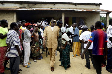The Prefect, Mohammed Cinq Keita (yellow)leaves the village of Bawa after giving a speech about the Ebola virus to the population. An Ebola virus epidemic of unprecedented proportions has broken out i...