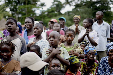 Inhabitants of the village of Bawa listen intently as the Prefect, Mohammed Cinq Keita, gives a speech about the Ebola virus to the population. An Ebola virus epidemic of unprecedented proportions has...