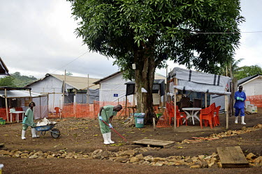 Workers from MSF (Doctors Without Borders)prepare the field hospital to fight Ebola virus in Gueckedou. An Ebola virus epidemic of unprecedented proportions has broken out in West Africa killing at le...