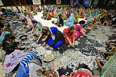 Women gathered at the East Africa Swaminarayan Satsang Temple count the change the temple received in donations. They have committed some of the money it raises to conservation work, in particular to...