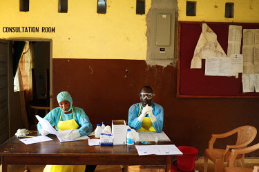 Nurses of Kenema Hospital working at the reception area of the hospital. The area of Kenema is one of the worst affected by the Ebola virus.  Sierra Leone is one of three countries severely affected b...