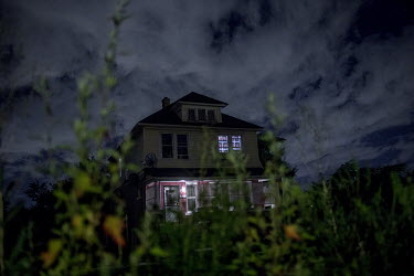 A family house at night.