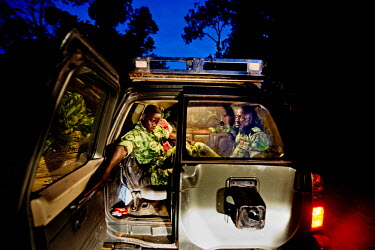 Ecoguards on patrol at night in a logging concession outside the Minkebe National Park. As longing concessions cut deeper into the forest they open up access for illegal logging and poaching.