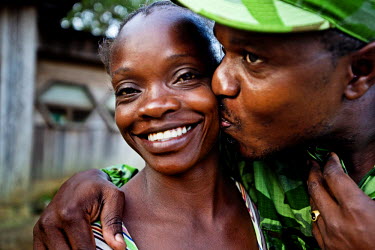 Park ranger, Soho Jocelyn, kisses his wife goodbye before leaving for a two week patrol in Minkebe National Park. Being a ranger in Central Africa has become increasingly dangerous as poachers frequen...