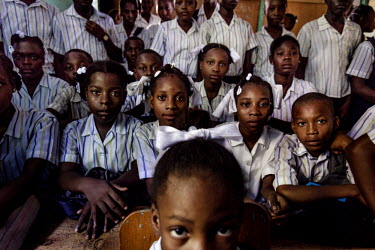 Children in the classroom of a Primary School. All of these children are 'restaveks' and receive free education provided by the advocacy group the Restavek Freedom Foundation. They still live with the...