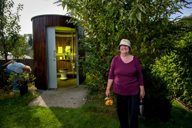 Helen Skelton, of the Finchley Horticultural Society, outside the Kazubaloo KL2 waterless toilet at the Gordon Road Allotments in Finchley, North London. The Finchley Horticultural Society was founded...