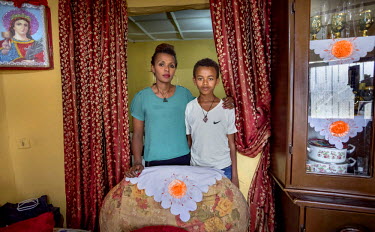 Meseret and her son Natti (15)in their home in Addis Ababa. Her husband was shot during the aftermath of the 2005 elections. Since she has been a widow for nine years now she is tries to live an cost-...