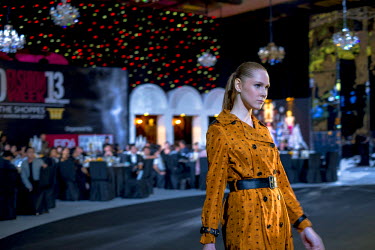 A model on the catwalk at the opening dinner of the Singapore Fashion Week 2013.