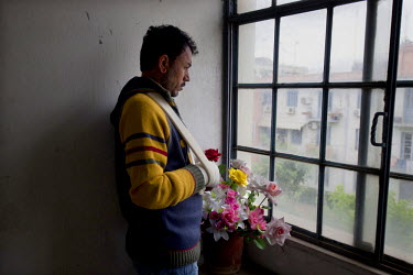 Altaf stares out of the window in the apartment that he and his son share with a few others. He lives a clandestine existence as although a red card holder Athens is one of the cities where he is not...