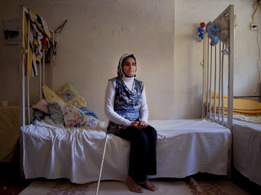 Thirty four year old Jihan in the Livrio refugee camp. She left Damascus, to escape the conflict, with her husband Ashraf and their sons Ahmed and Mohammad aged five and seven. Both husband and wife h...