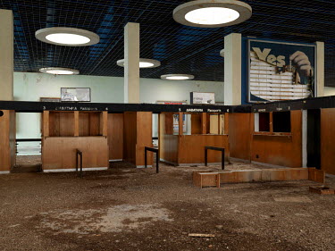 Passport and visa booths at the arrivals terminal in the disused international airport. It opened in 1968 and has been deserted since the Turkish invasion of 1974. It now sits in the Buffer Zone that...