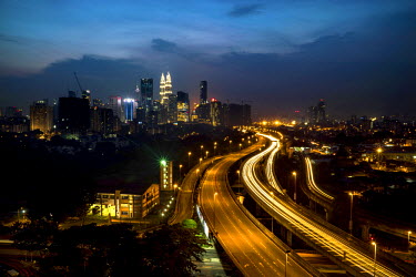 A road leads to and from the city centre with the iconic Petronas twin towers in the distance. Boleh means Can! in Malaysia Boleh is a commonly used phrase. By 2020, Malaysia aspires for its premier c...