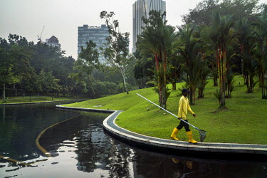 A cleaner walks alongside a pond at the KLCC park. Boleh means Can! in Malaysia Boleh is a commonly used phrase. By 2020, Malaysia aspires for its premier city the label of 'world class city'. To achi...