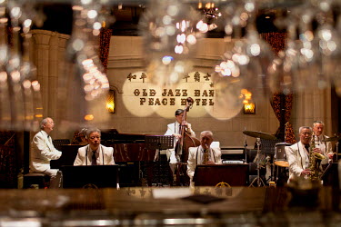 At Jazz Band playing at the Peace Hotel. Built originally as the Cathay Hotel by Sir Victor Sassoon in the early 20th century, the hotel is now operated by Canada's Fairmont Hotels and Resorts but sti...