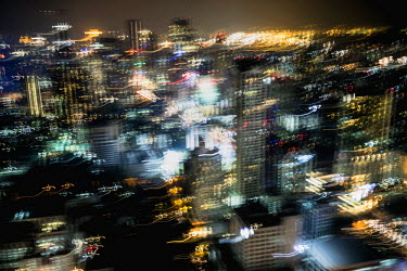 A view of central Bangkok from one of the high rise buildings. ~<i>This is Bangkok</i> Globalised and localised.  Everyone is plugged into something. Cosplay from Japan. Pop from Korea. Products from...
