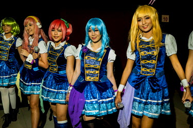 Young Thai Cosplayers dress up as the Japanese anime idol group AKB0048. Based on the cartoon, the AKB0048 interplanetary group is resurrected in the future and must take up arms and fight to bring mu...