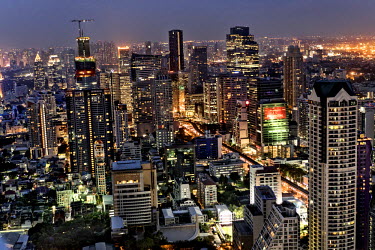 An aerial view of Bangkok from one of the high rise building. This is Bangkok Globalised and localised. Everyone is plugged into something. Cosplay from Japan. Pop from Korea. Products from China. Tou...