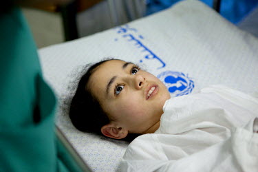 Weam Al Astal, a nine year old from Khan Younes, prepares to undergo surgery after she received serious injuries during the summer 2014 Israeli military operation ('Pillar of Defense') in the Gaza Str...
