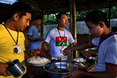 Recovering heroin addicts are served dinner at a residential rehabilitation facility run by the Kachin Baptist Convention (KBC). Kachin state, where most of Myanmar's jade comes from, has some of the...