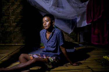Recovering heroin addict, Soe Aung, 24, who worked in the jade mines in Hpakant for 8 years and who has been addicted to heroin for 6 years, sits in his dormitory at a Kachin Baptist Convention drug r...