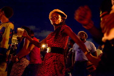 A woman dances at the monthly Afropolitan African root music concert in Freedom Park.