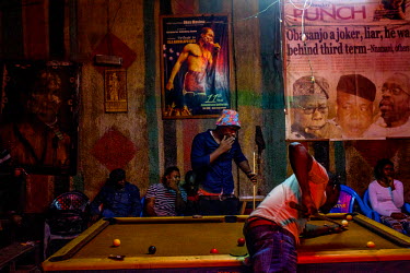 People playing pool at the Sunday Jump concert by Femi Kuti at the African Shrine club.
