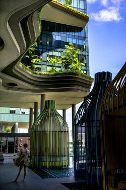 A part of the 300-meter-long garden strip on the fifth floor of the Parkroyal hotel which claims to have a total foliage cover of more than 200% of the structure's total land area, effectively using v...
