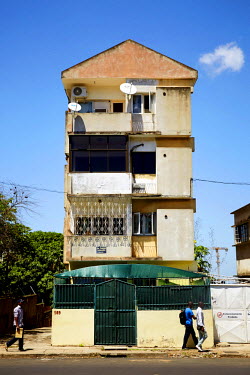 A multi-story residential building on Avenue Patrice Lumumba.