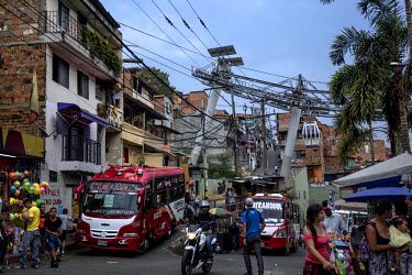 A street scene near the Santo Domingo metro-cable in Comuna 1, the first of several transformation projects in Medellin which connects the city's poorest neighbourhoods to the metro in the city center...