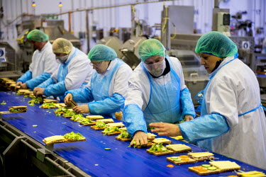 Workers prepare cheese and salad sandwiches at Greencore's Manton Wood facility near Worksop. Greencore's Food to Go factory in Manton Wood near Worksop in Nottinghamshire is the world's largest (and...
